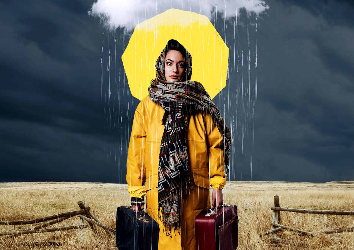 A woman standing in a field, holding two suitcases. There is a raincloud directly above her.